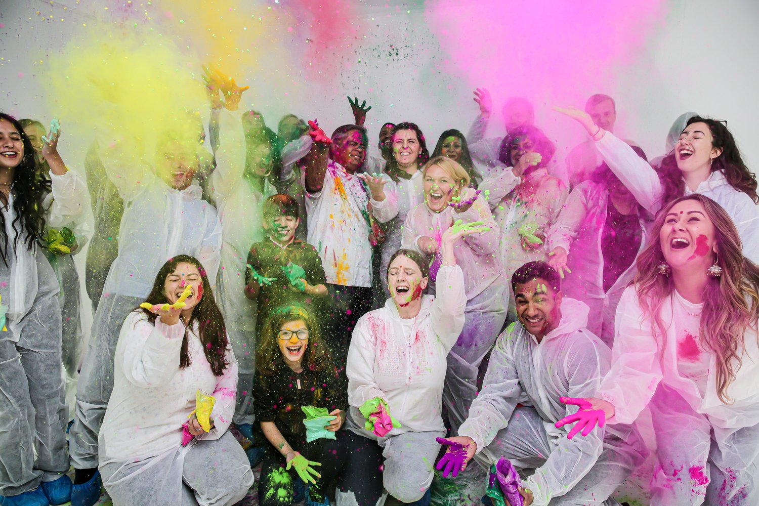People throwing holi powder