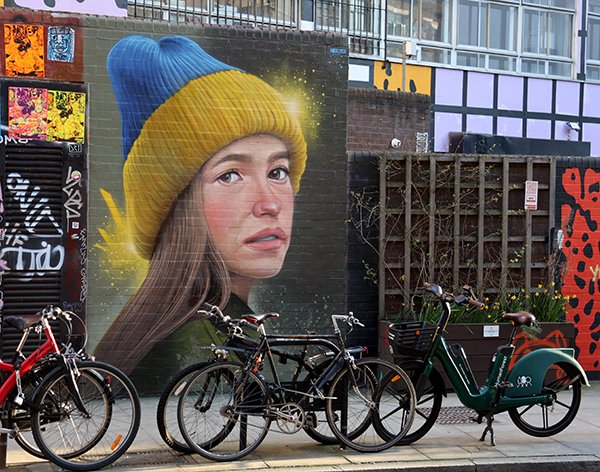Woskerski's Ukrainian girl wearing beanie portrait on Redchurch Street, Shoreditch