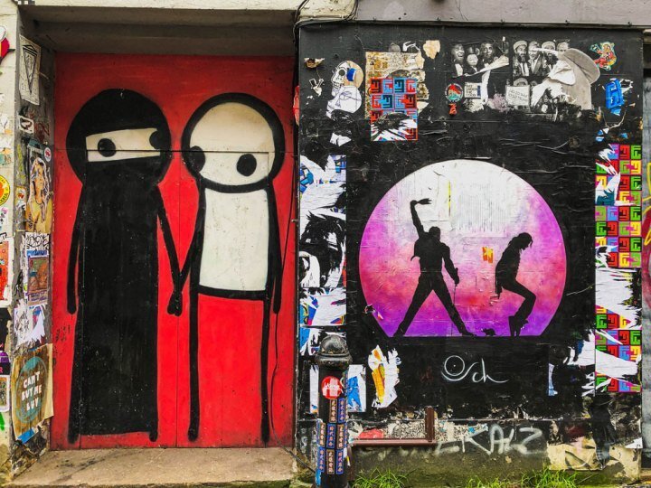 Stik's 'a couple holding hands' mural on Princlet Street, Shoreditch