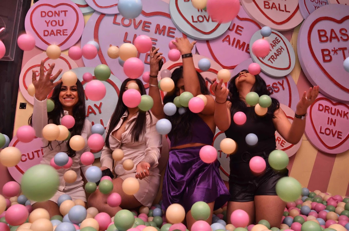 girls on a night out in the ball pit