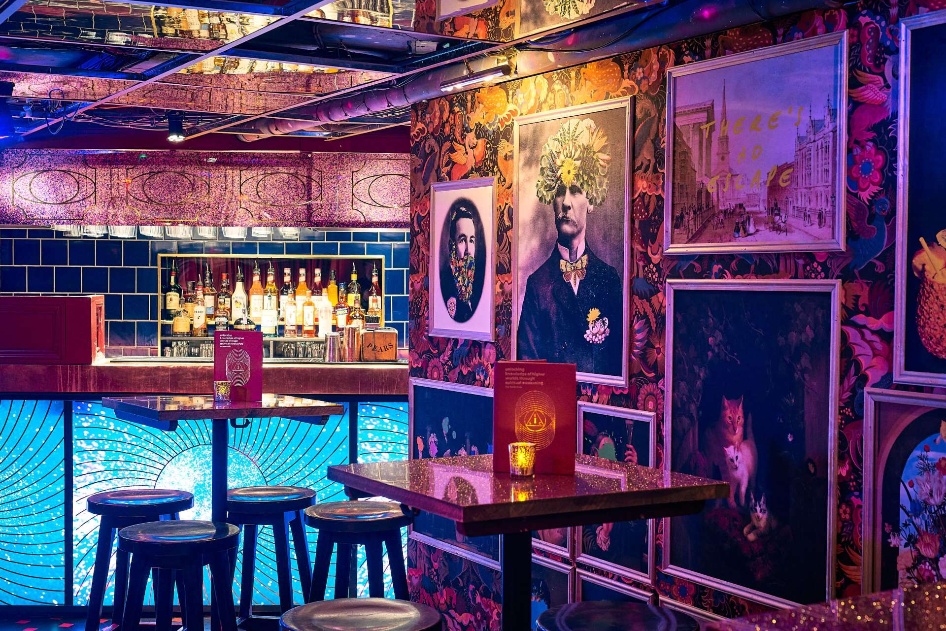 quirky interiors, wallpaper and hanging photos of the escapolgoist bar