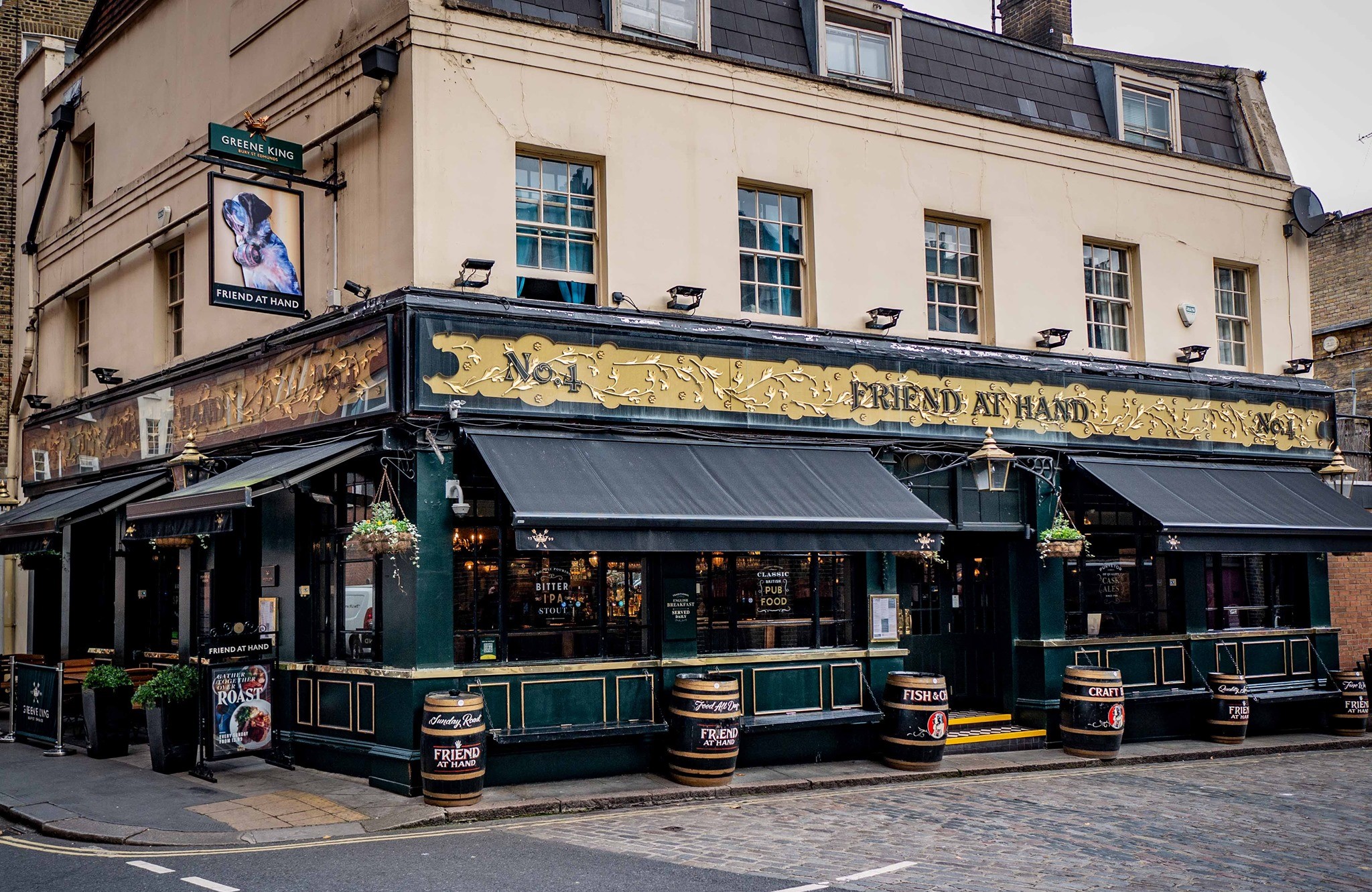 exteriors of the friend at home pub with barrels 